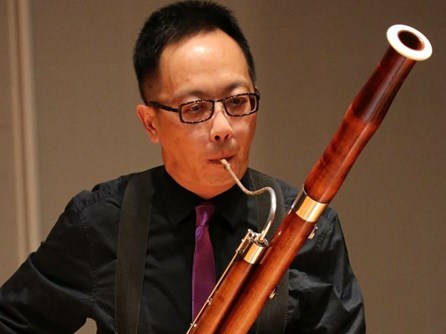 Hing Sang Chin, Principal Bassoon of the Hong Kong Sinfonietta. Article heading: 21 Years to Find the Perfect Bassoon