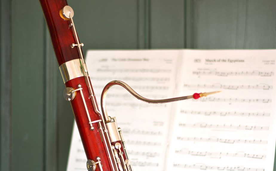 A second hand bassoon in front of sheet music at Double Reed Ltd.