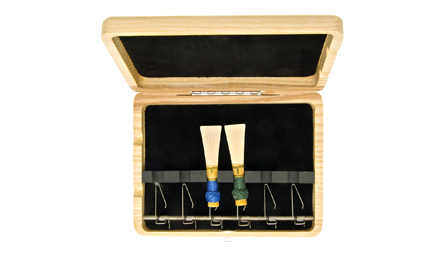 Top quality wooden bassoon reed case from EM for sale at Double Reed Ltd. This reed case features: space for six bassoon reeds, steel spring mechanism and foam insert to hold reeds securely in place, ventilation holes to allow reeds to dry, natural wood finish. The price of this bassoon reed case is £27.50