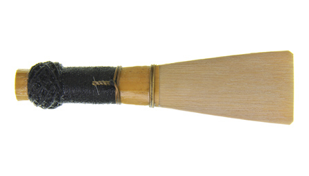 The Rieger K2 shape contrabassoon reed, by Rimpl, for sale at Double Reed Ltd. This reed is an alternative shape to the standard K1 shape commonly used. The K2 has convex blade edges, rather than straight, which gives a slightly darker sound but without losing focus. This is a professional quality reed. The price of this reed is £17.95
