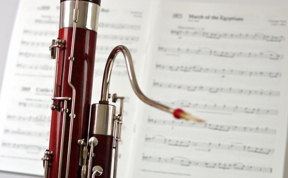A second hand bassoon in front of sheet music at Double Reed Ltd.