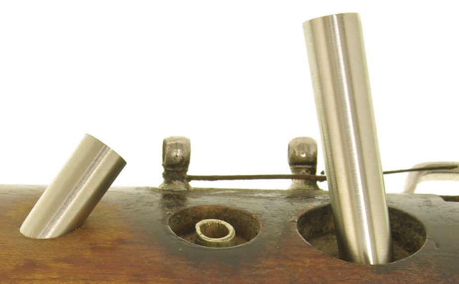 Finger holes being installed on a pre-war Heckel 5000 bassoon in the Double Reed Ltd. workshop, prior to the tops being cut off and shaped
