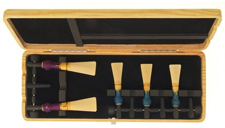 Top quality wooden bassoon and contrabassoon reed case from EM for sale at Double Reed Ltd. This reed case features: space for three contrabassoon reeds and five bassoon reeds, foam insert to hold reeds securely in place, ventilation holes to allow reeds to dry, natural wood finish. The price of this reed case is £54.50